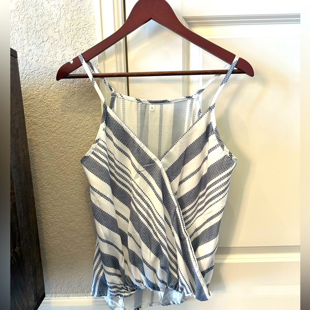 Cute v neck tank top. New without tags.